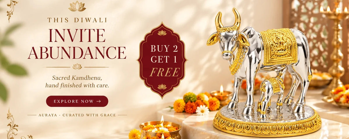 This Diwali, invite abundance. Sacred Kamdhenu cow and calf idol in silver and gold finish polyresin. Buy 2 Get 1 Free.
